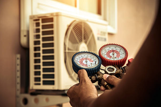Professional Heat Pump Repair technician working in Viola, NY
